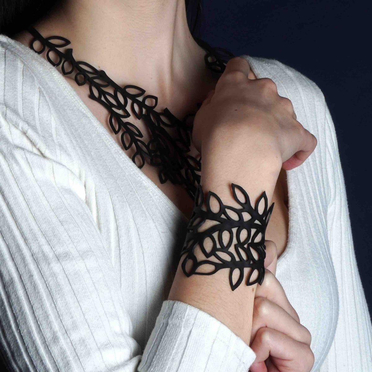 Evergreen black recycled rubber leaf necklace detail