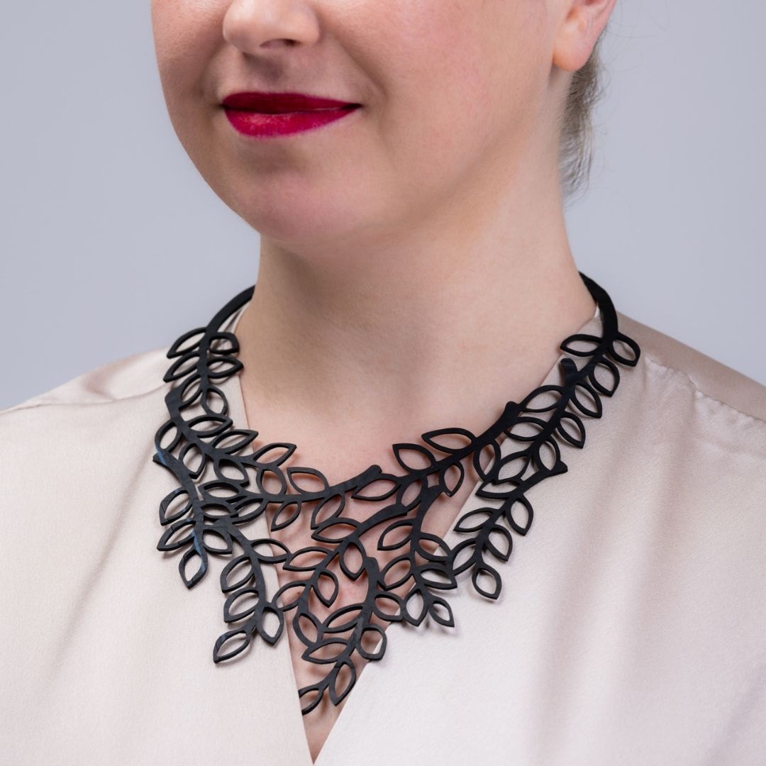Evergreen recycled rubber leaf necklace lifestyle view