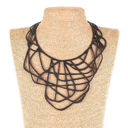 Orion black recycled rubber cutout necklace close up